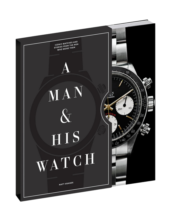 Libro con portada negra «A MAN & HIS WATCH» y reloj a la derecha