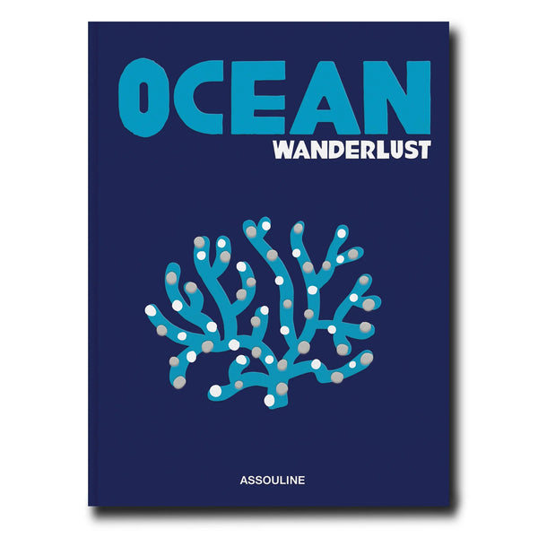 Libro de Océano Wanderlust con portada azul y coral gráfico en tonos turquesa