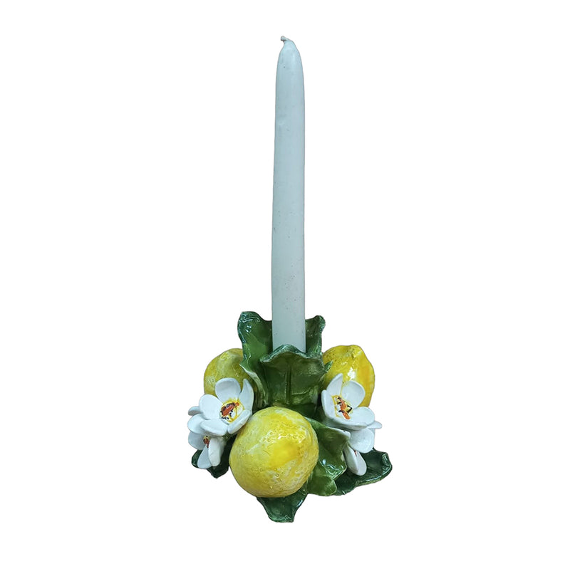 Candelabro Limón L con vela azul; hojas verdes, limón amarillo y flores blancas