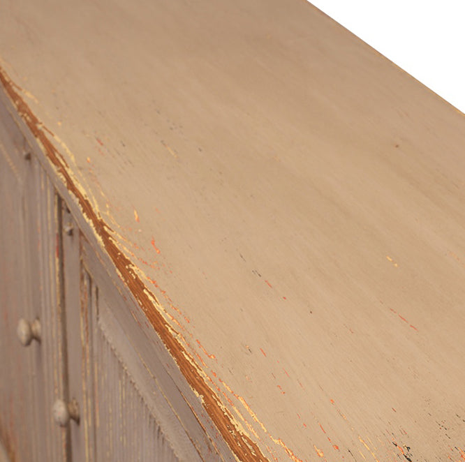Tablero superior de madera gris envejecida, canto con pintura desgastada