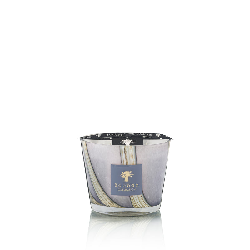Vela en vaso de vidrio con vetas grises y etiqueta azul Baobab Collection