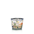 Vela Baobab en vaso de vidrio con tapa azul, diseño de esquí y pinos.