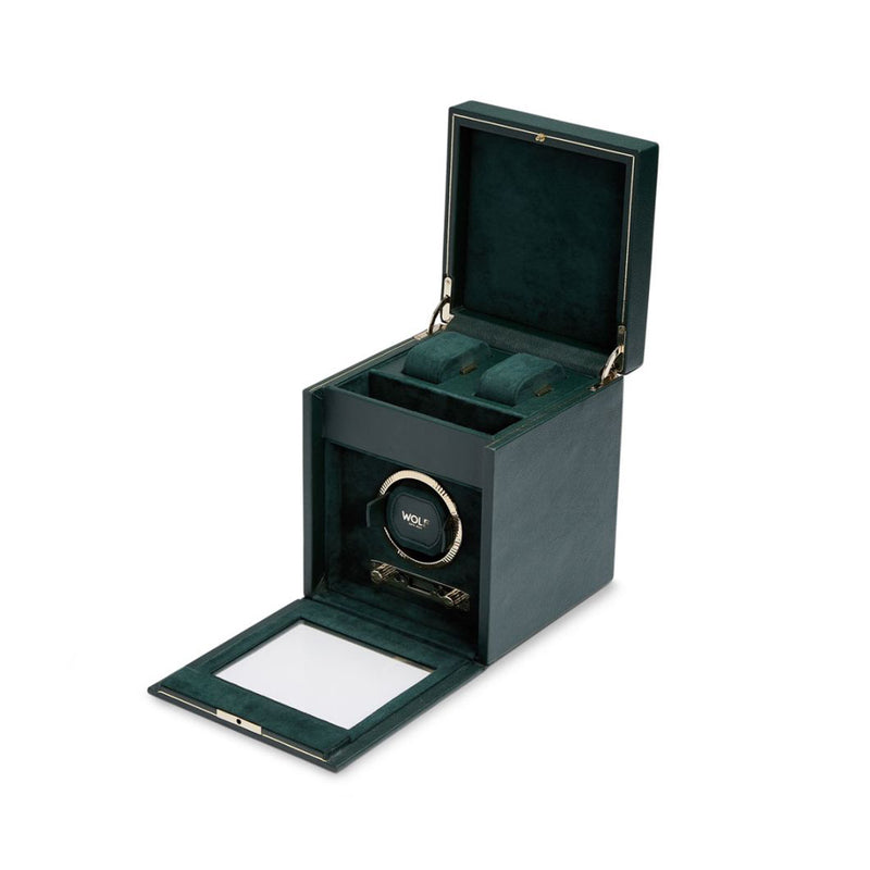 Caja de relojes verde oscuro abierta con compartimento interior acolchado y base abatible