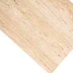 Placa de travertino beige con vetas y textura salpicada para la encimera.