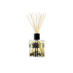 Difusor Florio Ortigia: botella transparente con tapa negra y varillas aromáticas