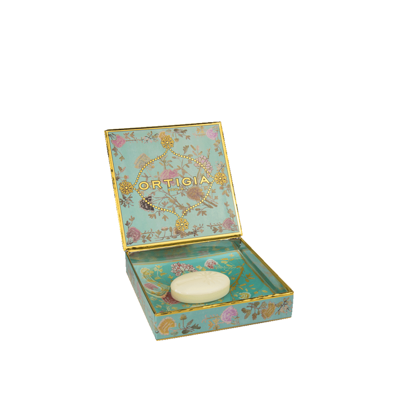 Plato decorativo con jabón Ortigia: caja abierta turquesa floral con jabón blanco