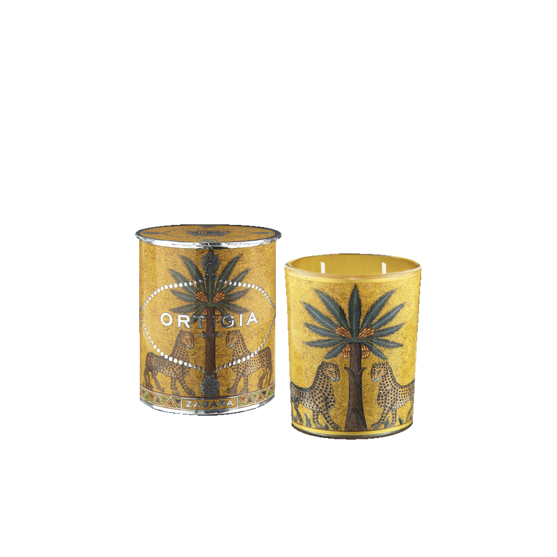Vela Ortigia en frasco amarillo con tapa metálica y estampado botánico