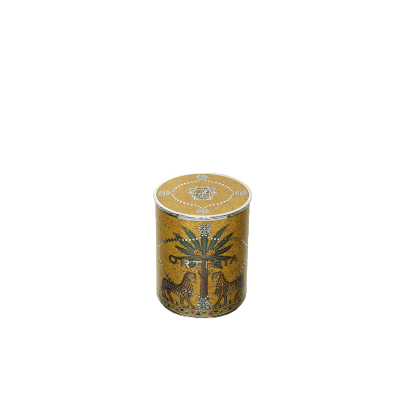 Vela Ortigia en frasco amarillo con tapa y diseño circular con texto ORTIGIA