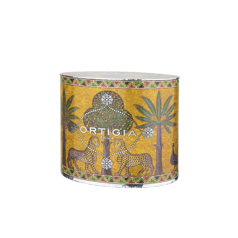 Estuche cilíndrico dorado Ortigia con ilustración de leones, palmeras y flores.