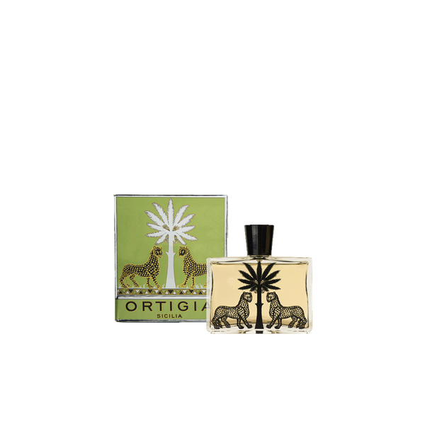 Eau de Parfum frasco con tapa negra y caja verde con ilustración