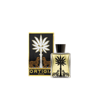 Aceite corporal Ortigia Ambra Nera en frasco de cristal con tapón negro.