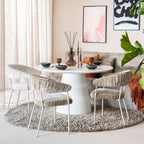 Mesa de comedor redonda blanca con base central para uso en comedor