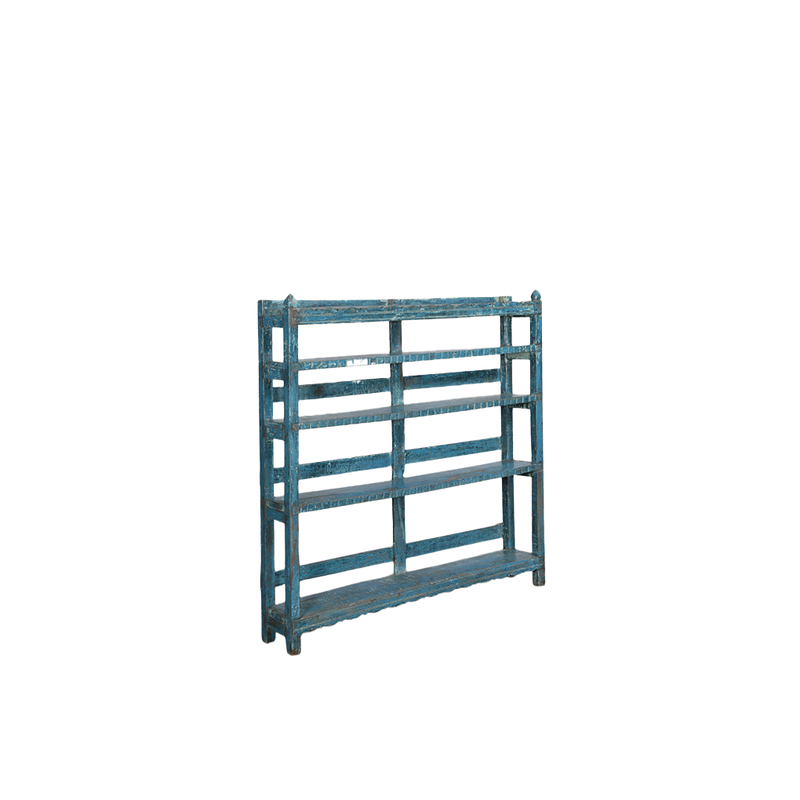 Librería de madera con pátina azul, vista lateral con paneles ranurados