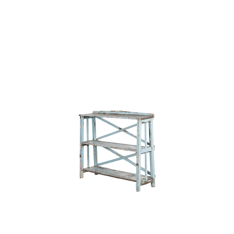Librería de madera azul claro con pátina, estantes dobles y estructura de cruces