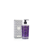 Gel de manos en botella morada con dosificador y caja a juego, diseño geométrico.