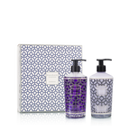 Set de gel de manos: dos botellas moradas y blancas con dosificador y caja.