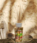 Difusor Provence con frasco de vidrio y varillas, diseño floral.
