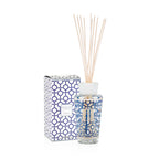 Difusor de aroma Baobab con varillas; caja y frasco azul con patrón geométrico