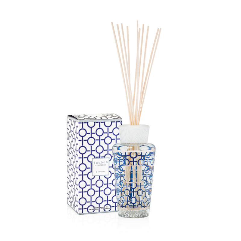 Difusor de aroma Baobab con varillas; caja y frasco azul con patrón geométrico