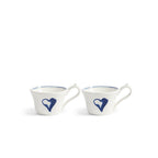 Juego de 2 tazas Anouk blancas con asa y dibujo azul en forma de corazón