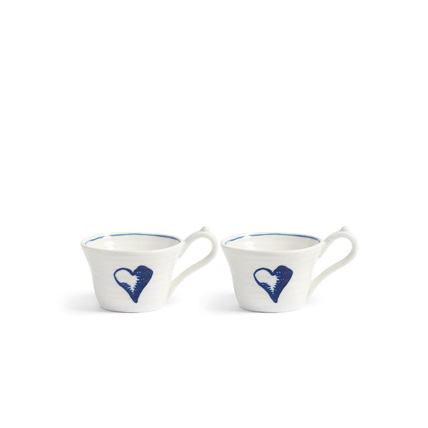 Juego de 2 tazas Anouk blancas con asa y dibujo azul en forma de corazón
