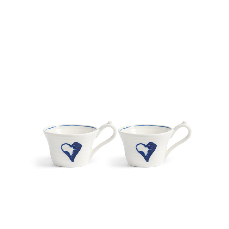 Juego de 2 tazas Anouk blancas con asa y dibujo azul en forma de corazón