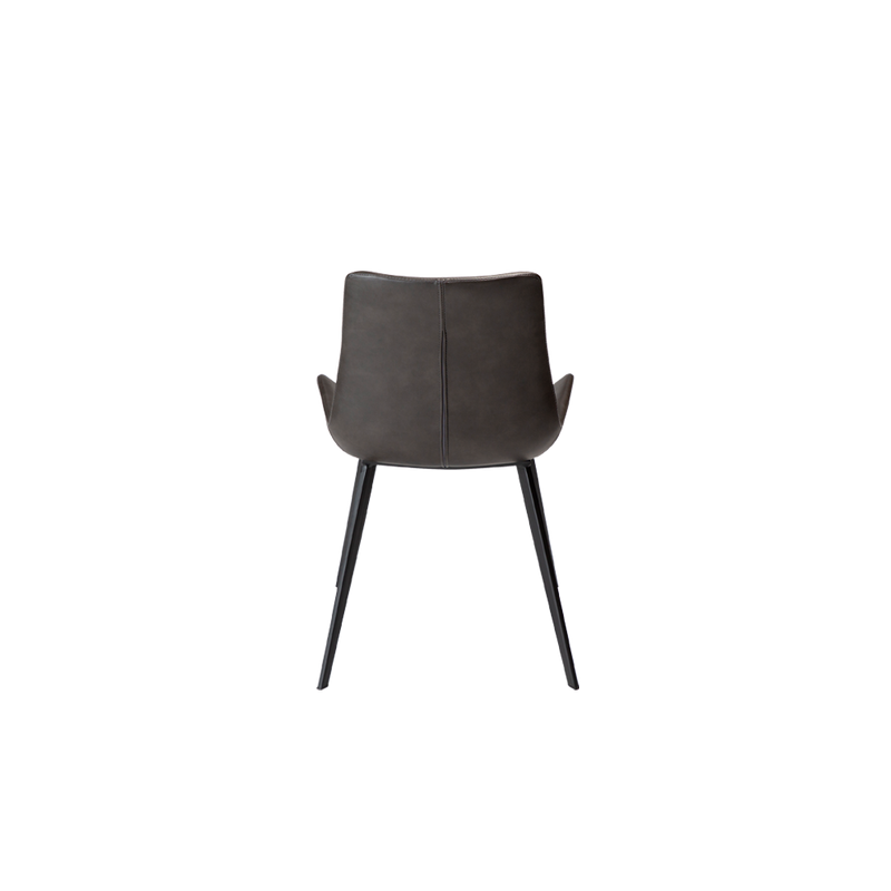 Silla tapizada gris vintage con respaldo alto y costuras al centro, vista trasera
