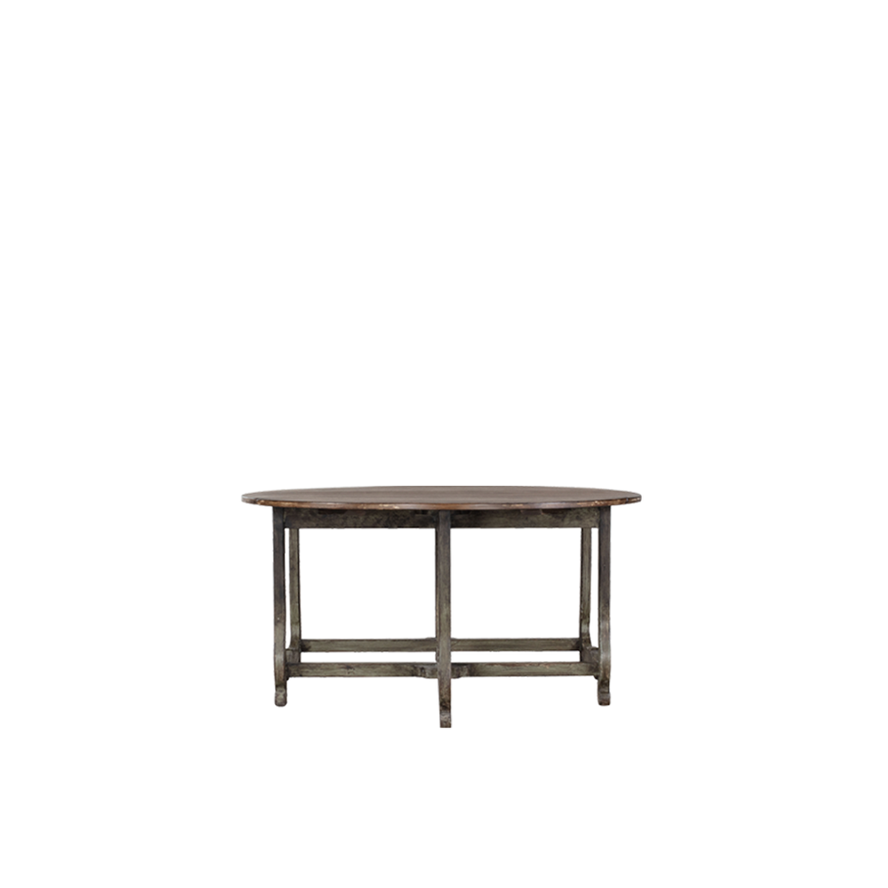 Mesa de comedor redonda con tablero de madera envejecida y patas metálicas oscuras