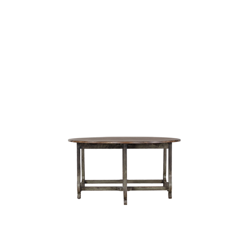 Mesa de comedor redonda con tablero de madera envejecida y patas metálicas oscuras