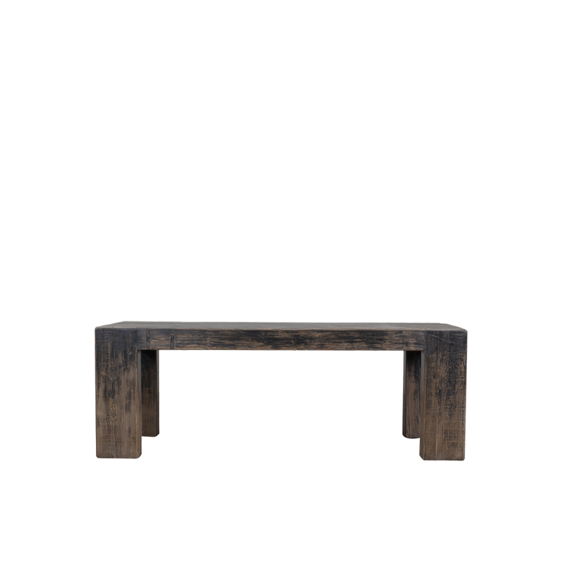 Mesa de comedor de madera oscura con patas escalonadas y acabado envejecido.