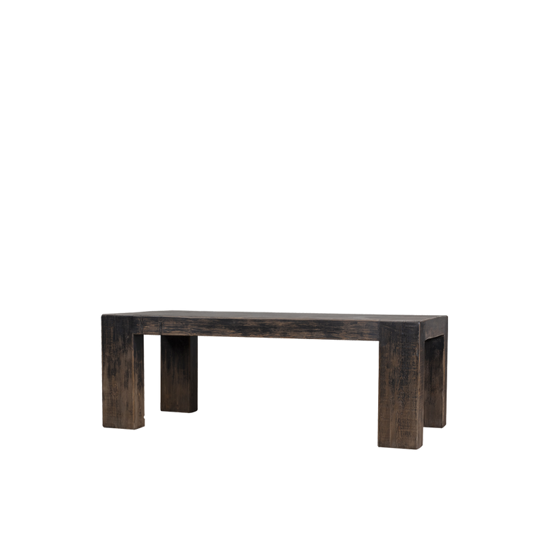 Mesa de comedor rectangular de madera oscura con patas gruesas y bastidor visible.