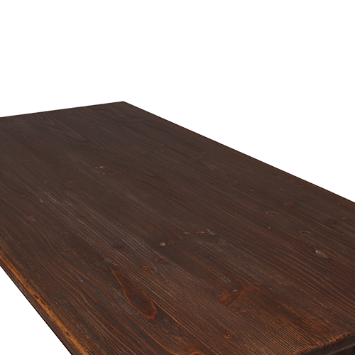 Tablero de madera oscura con vetas marcadas y borde biselado de la mesa Heritage