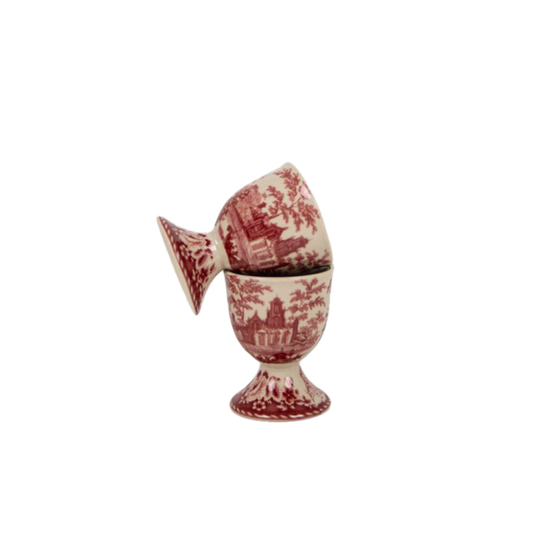 Huevera de porcelana blanca con decoración roja y tapa abatible abierta