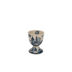 Huevera de cerámica azul y blanca con motivo de castillo, forma de copa