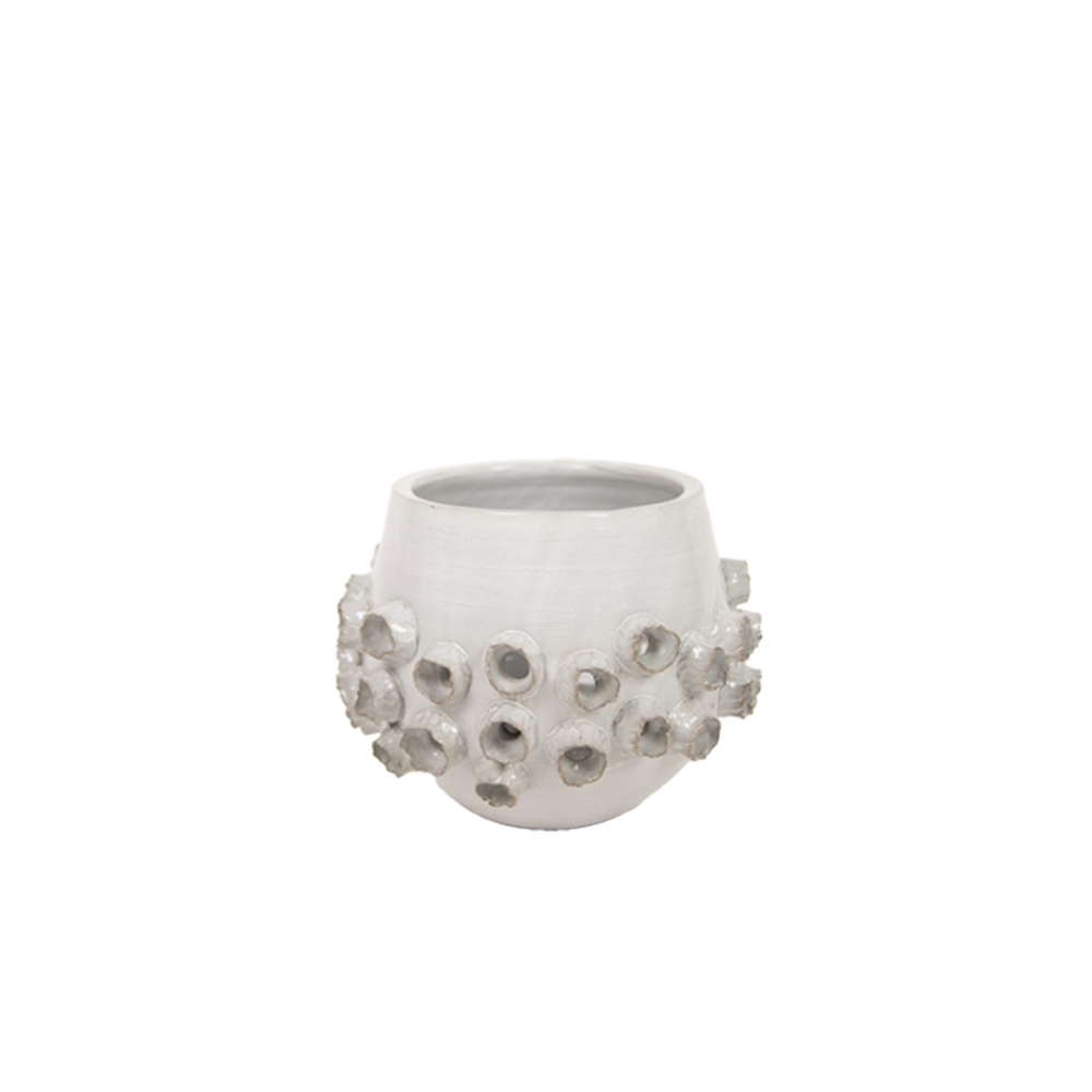 Macetero Solange blanco con relieve de piedras alrededor