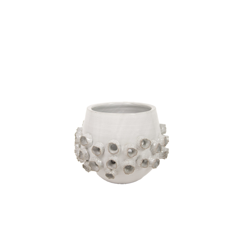 Macetero Solange blanco con relieve de piedras alrededor