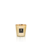 Vela en vaso metálico dorado con etiqueta Baobab Collection