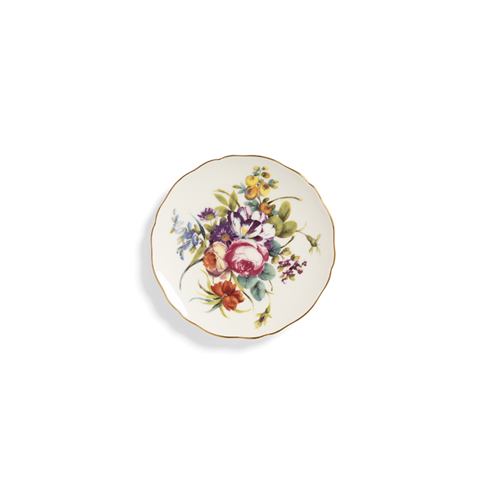 Plato de porcelana blanco con ramo de flores multicolor y ribete dorado