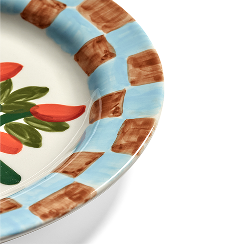 Plato llano: borde con bloques azules y terracota alrededor del diseño.