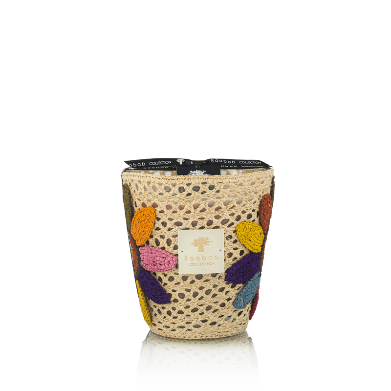 Vela en frasco de malla beige con flores bordadas en naranja, morado y amarillo