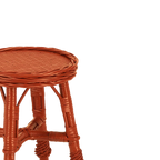 Asiento redondo de taburete de mimbre terracota con tejido de fibras y soporte