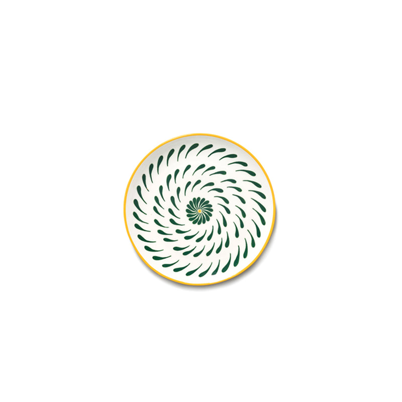 Plato de desayuno redondo con estampado espiral radial verde sobre fondo claro