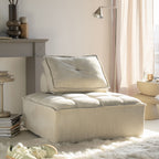 Módulo de sofá tapizado beige, con reposacabezas y asientos acolchados