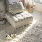 Módulo de sofá tapizado beige con respaldo reclinable y reposacabezas