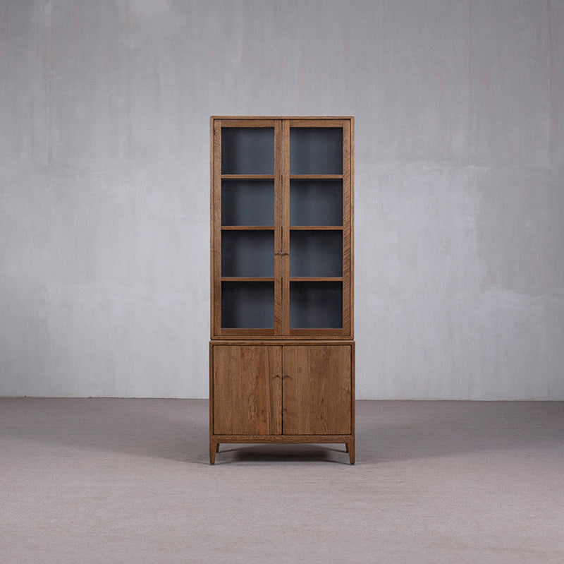 Vitrina alta de madera Heritage con puertas de vidrio y doble base abatible