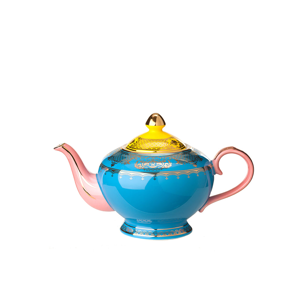 Tetera de porcelana azul con asa y vertedor rosados, tapa dorada decorada