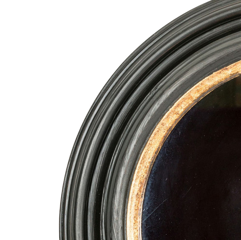 Espejo circular de madera con marco oscuro texturizado y canto dorado