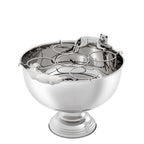 Champañera plateada con figuras de animal y soporte circular de metal sobre la copa.