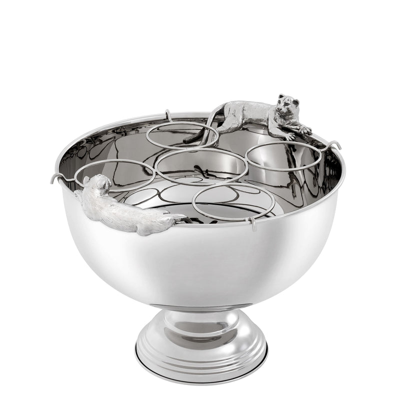 Champañera plateada con figuras de animal y soporte circular de metal sobre la copa.