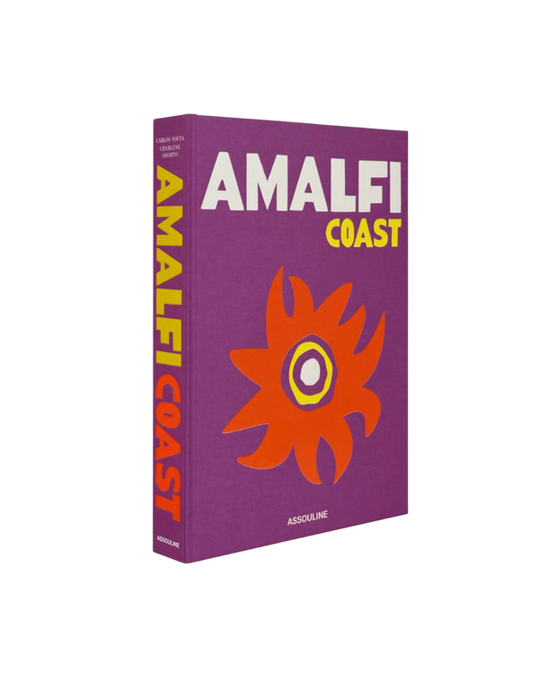 Caja-libro de tapa dura morada con portada «AMALFI COAST» y logo Assouline